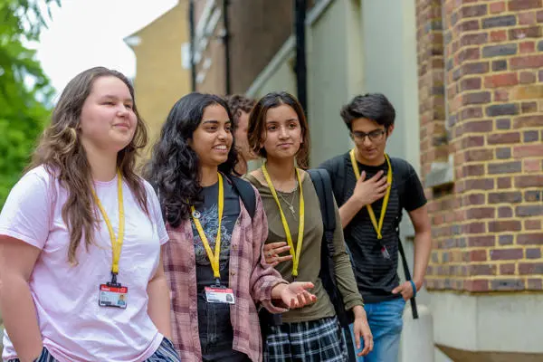 Smiling girls students prospectus front page
